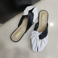 Chic White & Black Twist-Front Slip-On Flats – Minimal Elegance