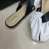 Chic White & Black Twist-Front Slip-On Flats – Minimal Elegance