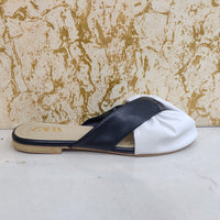 Chic White & Black Twist-Front Slip-On Flats – Minimal Elegance